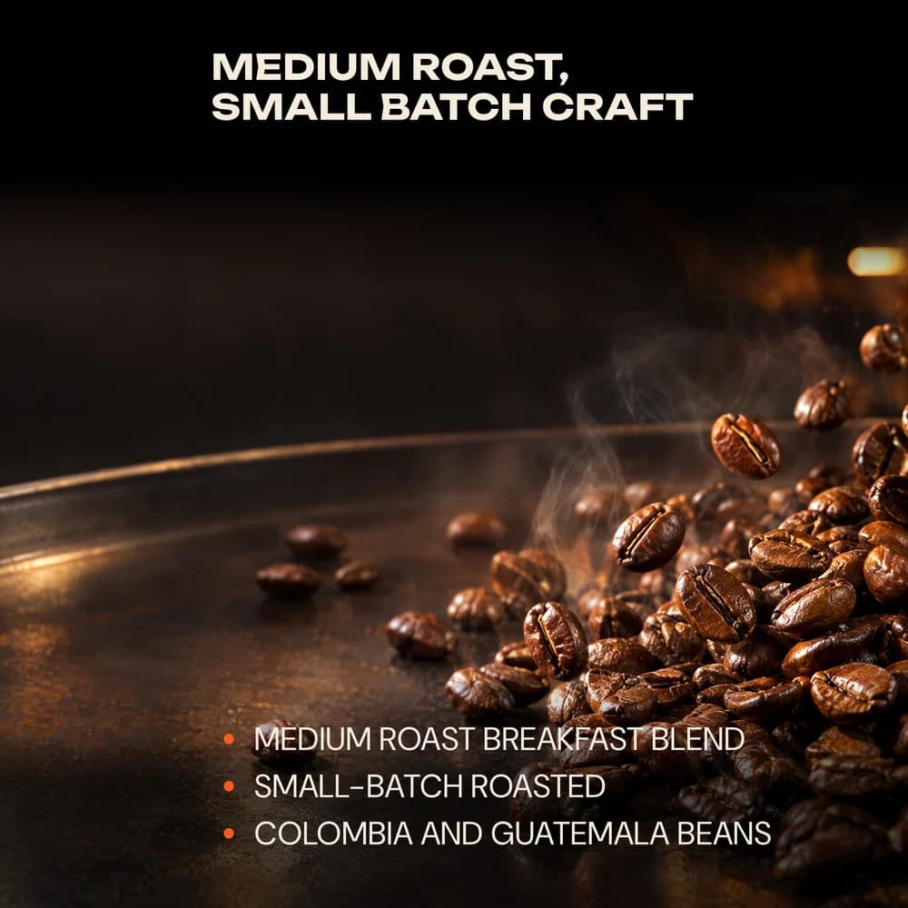Roasted coffee beans on a dark tray with the headline Medium roast, small batch craft and three proof points